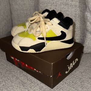 Jordan x Travis Scott Kids Cream and Yellow Sneakers